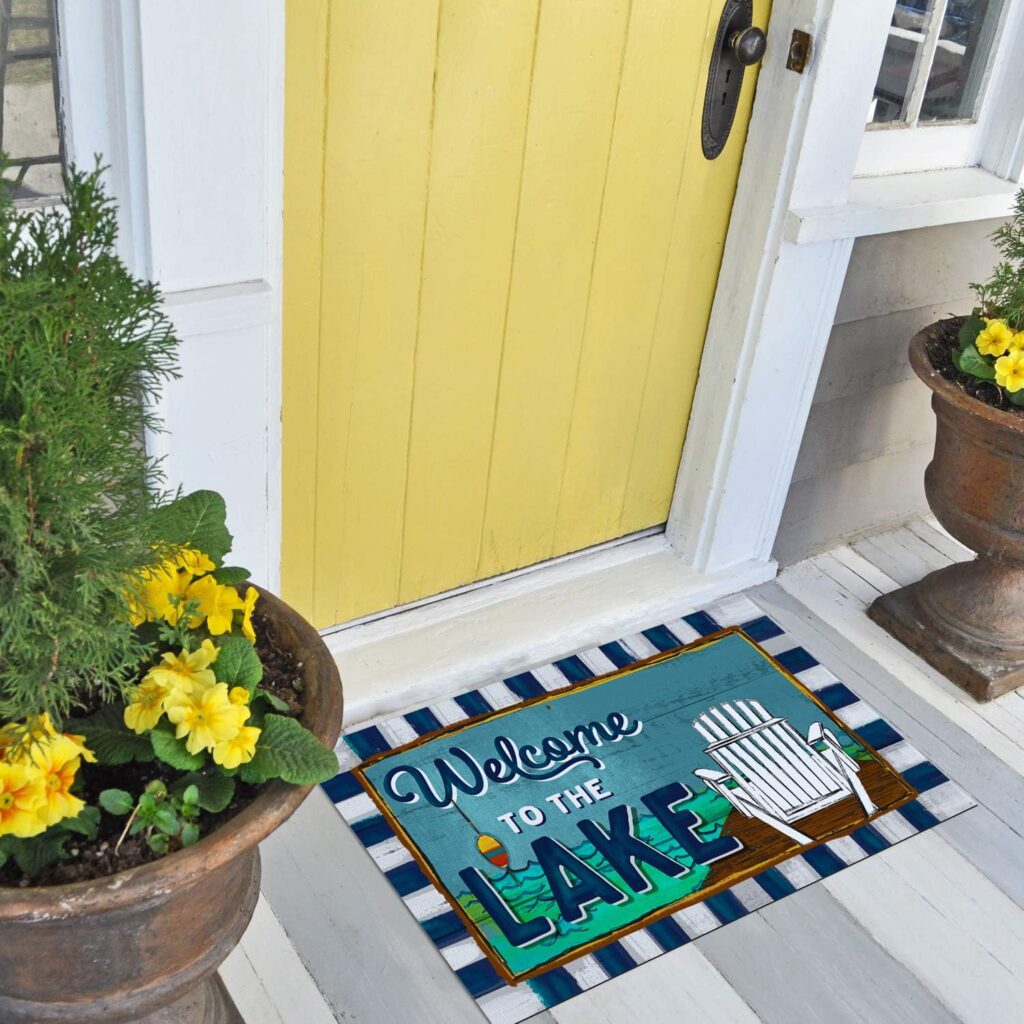 A "Welcome to the Lake" doormat in front of a yellow door.