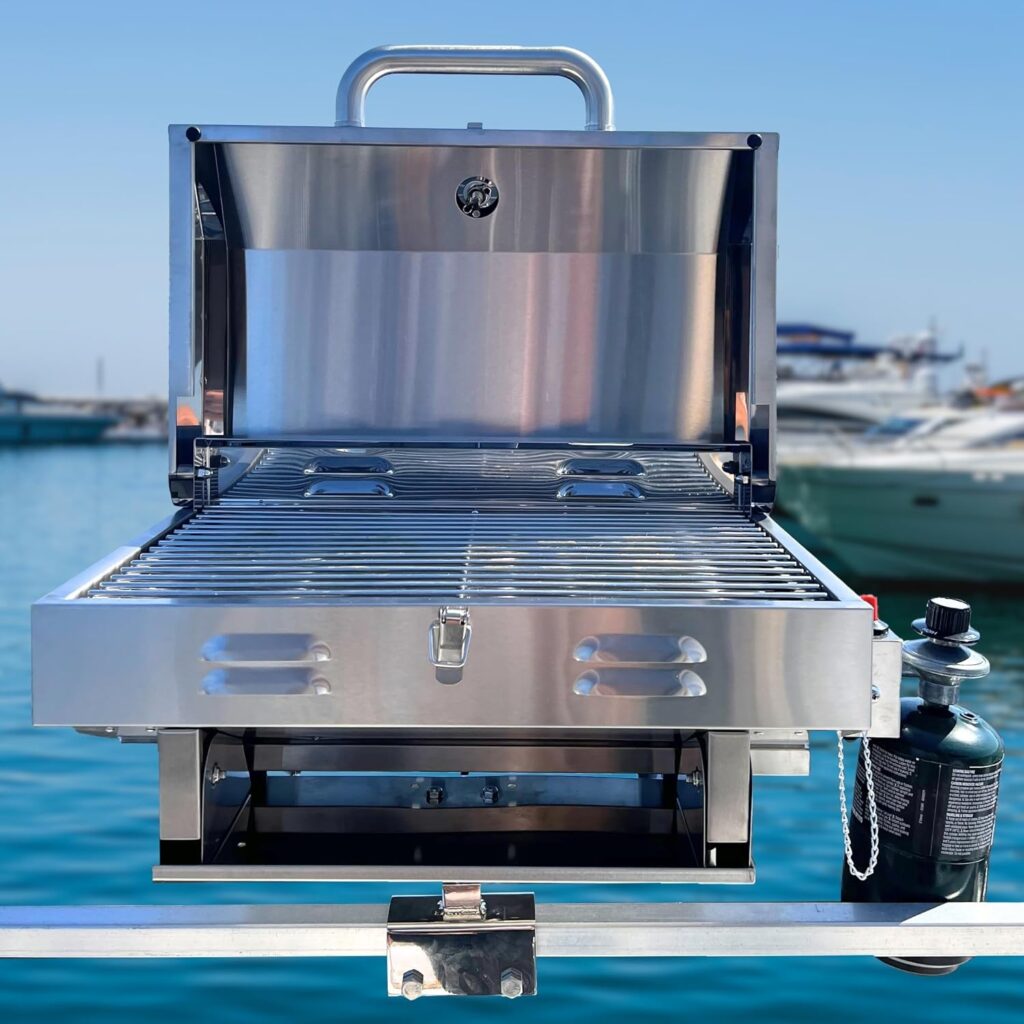 stainless steel grill mounted on the square side rail of a pontoon boat